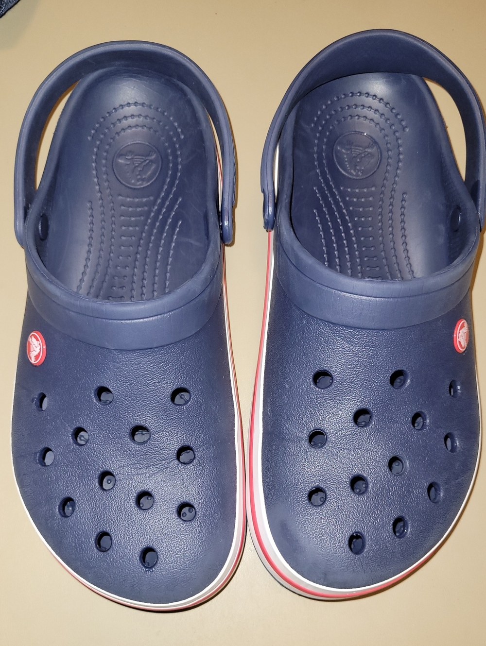 Crocs - Size 9 Mens Or 11 Womens. Blue With White & Red Stripes.